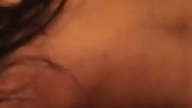 Asian wife gives a blowjob to her husband